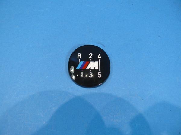 Emblems M-Tech. 1. gear down for gear knob BM 1221284